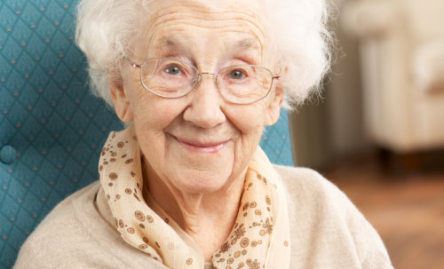 Female senior holding a book