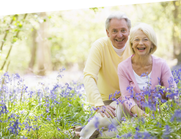 Happy senior couple in a garden